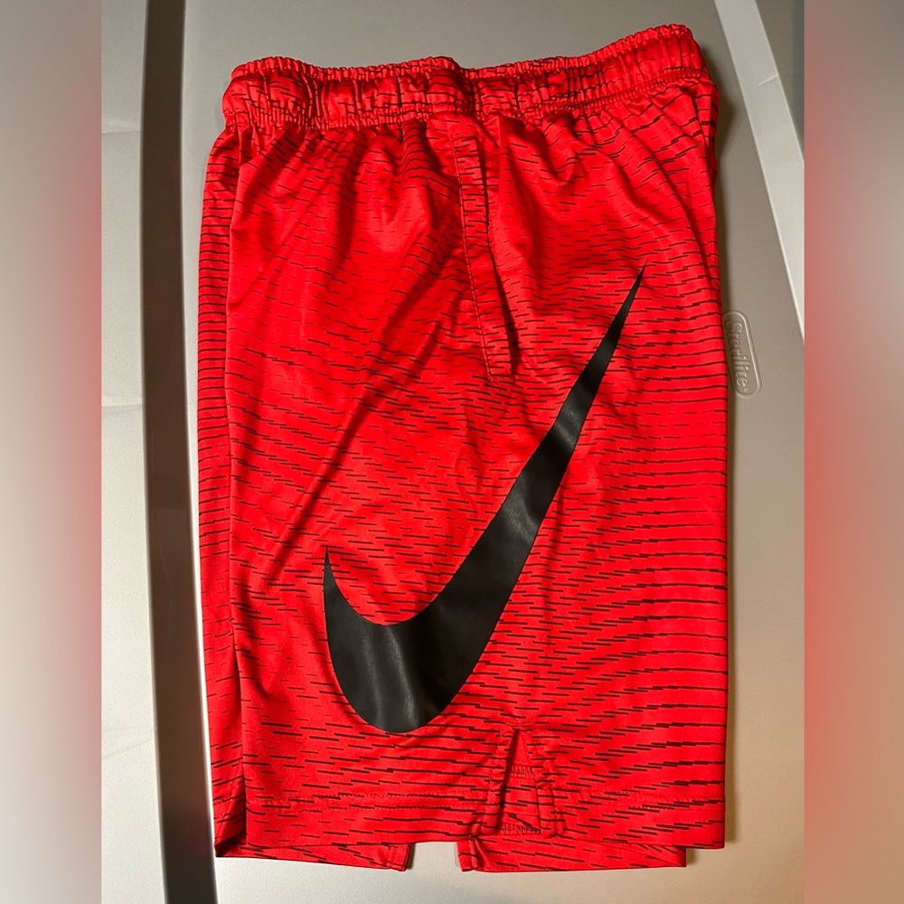 Boys Nike size large red and black shorts